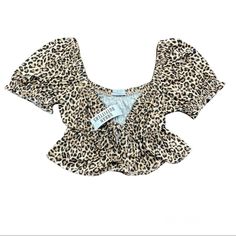 Urban Outfitters Cheetah Print Tie Front Crop Top Size Medium -Puff Sleeve -Animal Print -Super Soft -Ruffle Sleeve Trim -Pairs Perfectly With Any Kind Of Denim Bottoms! Material Content 96% Polyester 4% Elastan New With Tags! Cheetah Top, Denim Bottoms, Front Crop Top, Urban Outfitters Tops, Printed Ties, Cheetah Print, Puff Sleeve, Urban Outfitters, Animal Print