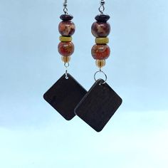 Dangle Earrings With Large Beads For Gift, Adjustable Brown Beaded Earrings With Large Beads, Brown Large Beads Dangle Earrings, Brown Large Beaded Dangle Earrings, Brown Dangle Earrings With Large Beads, Brown Dangle Beaded Earrings With Large Beads, Brown Wooden Bead Drop Earrings, Multicolor Dangle Beaded Earrings With Wooden Beads, Brown Wooden Beaded Earrings As Gift