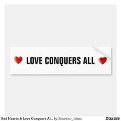 love conquers all bumper sticker with red hearts on the back and white background