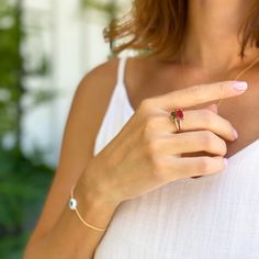 This watermelon tourmaline ring with a stylish split shank is exquisitely crafted in 925 sterling silver with 14K gold plating. Sparkling cubic zirconia is set into the shoulders of the ring band and accentuate the piece. Watermelon tourmaline is believed to have balancing powers that can help you magnify your strengths and release your insecurities. This ring will help you rediscover the meaning if you feel disconnected. Everyday Tourmaline Gemstone Jewelry, Tourmaline Birthstone Jewelry For Promise Ring, Tourmaline May Birthstone Promise Rings, Everyday Open Crystal Gemstone Ring, Tourmaline Promise Ring For May Birthstone, Everyday Emerald Ring As Birthstone, Tourmaline Birthstone Rings For May, Stackable Tourmaline Rings Fine Jewelry, Stackable Tourmaline Rings In Fine Jewelry Style