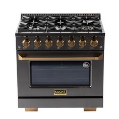 a black and gold stove top oven with four burners on the front, and two doors