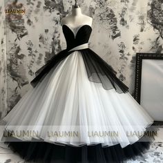 White And Black Ball Gown, Black And White Ball Gowns, Fitted Black Ball Gown For Wedding, Black And White Ball Dress, White Tulle Ball Gown For Banquet, White Tulle Ball Gown For Banquets, Black Sweetheart Neckline Ball Gown For Wedding, White Tulle Evening Gown, Fitted White Tulle Evening Dress