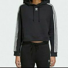 Adidas Originals Women's Cropped Hoodie Size Medium Brand New With Tag Black Sporty Hoodie For Spring, Black Hoodie With Ribbed Cuffs For Spring, Adidas Three Stripes Hoodie For Fall, Adidas Hoodie With Three Stripes For Fall, Casual Spring Hoodie With Three Stripes Branding, Black Sports Sweatshirt For Spring, Sporty Black Hoodie With Three Stripes, Black Sweatshirt For Sports In Spring, Casual Hoodie With Three Stripes For Fall