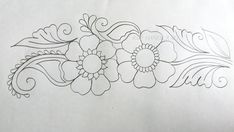 a drawing of some flowers on paper