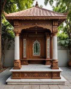 a wooden gazebo sitting in the middle of a courtyard with columns and windows on each side