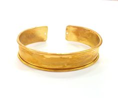 Nickel Free and Lead Free Material : Raw brass Color: Raw brass Size : 15mm Blank Size : 11,7mm Quantity : 1 pc. To see other all Raw Brass Bracelet Blanks please click below https://www.etsy.com/shop/AZsupplies/search?search_query=bracelet+blank+raw+brass&order=date_desc&view_type=list&ref=shop_search To see other all Raw Brass Ring Blanks please click below https://www.etsy.com/shop/AZsupplies/search?search_query=nice+raw+ring+blank&order=date_desc&view_type=list&ref=sh Wide Band Yellow Gold Bracelets As Gift, Wide Band Yellow Gold Bracelets For Gift, Adjustable Gold Band Cuff Bracelet, Adjustable Yellow Gold Round Cuff Bracelet, Adjustable Gold Round Cuff Bracelet, Gold Bracelets With Thick Band For Gifts, Adjustable Wide Band Gold Bracelet, Gold Band Cuff Bracelet As Gift, Gold Band Cuff Bracelet Gift