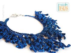 a necklace with blue beads on it