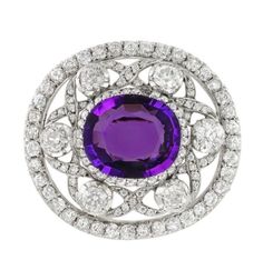 Edwardian era Inspired Antique 925 sterling silver cz zircon 5.00 ct Amethyst brooch wedding brooch/ love gift Metal: Sterling Silver Metal Purity: 925 Metal Wt:.12.98 Grams Diamond Type: American Diamond / CZ Zircon Diamond Color: white Diamond Clarity: I1-I2 Diamond Cut: Good Diamond Shape: Round Diamond Wt: 8.89 Ctw Gemstone: Amethyst Gemstone creation: Lab created Gemstone weight: 5.00 ctw Length:1.5 inches Width:2.5 inches Product Color: Oxidized Black and Gold Rhodium Plated on Sterling Si Platinum White Gold Fine Jewelry Brooch, Classic Round Diamond Brooches, Luxury Sterling Silver Brooches, Fine Jewelry Diamond Gemstone Brooches, Classic Diamond Brooch, Formal Round Cubic Zirconia Gemstones, White Gold Diamond Brooch With Brilliant Cut, Round Cubic Zirconia Gemstones For Formal Occasions, Diamond Brooches In Brilliant Cut White Gold