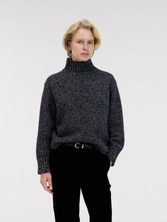 It is exceptionally soft and durable.We just want to reach out and touch this perpetually chic sweater.Designed for all wearing occasions and endless adventures. - Relaxed fit cozy wool sweater- Basic designe with turtle neck  - Ribbed hem and cuffs - We love the modern kind of cozy sweater- It fits loosely and easily- Super soft, no wardrobe is complete without this forever-polished knit Black Merino Wool Turtleneck For Fall, Wool Polo Sweater With Funnel Neck For Fall, Wool Funnel Neck Polo Sweater For Fall, Workwear Textured Knit Sweater With Funnel Neck, Textured Knit Funnel Neck Sweater For Work, Wool Turtleneck For Work, Wool Turtleneck For Workwear, High Neck Wool Sweater For Work, Winter Workwear Textured Knit Turtleneck