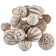 a bunch of white and brown balls sitting on top of each other