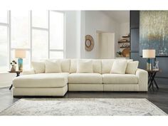 a living room with a large white couch