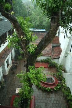 an aerial view of a courtyard in the rain