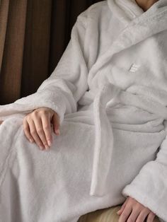 A staple in House bedrooms and Cowshed spas, our House robe is great for unwinding post-shower. Crafted from 100% recycled polyester with an embroidered Soho House logo on the chest, the robe has a fluffy, soft texture and is designed with a hood for extra comfort. Gift it to a friend, or keep it for yourself for cosy, everyday lounging.. Fluffy hooded robe with attached belt. 100% recycled polyester. GRS-TR certification (Global Recycled Standard). Made by Italian textiles company Frette. Embro Soho House Barcelona, Shoreditch House, Book Mood, Flannel Robe, Lounge Interiors, Italian Textiles, Soho Home, House Logo, House Bedrooms