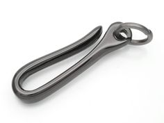 a pair of scissors sitting on top of a white surface