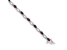 Rhodium over 14k white gold 0.104 cttw diamond and 3.900 cttw garnet bracelet. Measures approximately 1/8 of an inch in width and has a box catch closure. Formal Fine Jewelry Diamond Bracelet With Birthstone, Formal White Gold Bracelet With Birthstone, Formal White Gold Birthstone Bracelet, Classic Garnet Jewelry With Gemstone Accents, Elegant Garnet Jewelry With Diamond Accents, Garnet Jewelry With Prong Setting For Formal Occasions, Formal Garnet Jewelry With Prong Setting, Formal Garnet Gemstone Bracelets, Elegant Garnet Bracelets For Formal Occasions