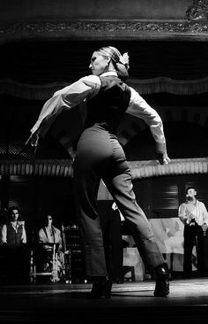 a woman standing on top of a stage