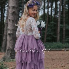 Beautiful Bohemian Vintage style ruffle occasion dress with a Mauve / Heather toned soft tulle. A lined off white lace upper bodice with 3/4 length sleeves.  The tulle is a beautiful blend of a slushy silver and purple toned coloured chiffon.  This is finished with a beautiful crossed, sheer eyelash lace back.   Available in ages 6 months to 13 years - the sizes variations are for average age western child body frame, for UK and USA this is the same.  Please simply order the age of the child if Ruffled Lace Bridesmaid Dress, Bridesmaid Lace Dress With Ruffles, Flowy Lace Dress With Ruffles, White Ruffled Tutu Dress For Bridesmaids, Fitted Tutu Dress With Ruffles For Bridesmaid, White Tiered Tutu Dress With Ruffles, White Long Sleeve Tutu Dress With Ruffles, Long Sleeve Tutu Dress With Ruffles For Wedding, Purple Lace Dresses With Ruffles