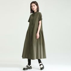 Sku CY-!119101 Material Cotton Style Irregular Feature Solid Color Neckline Stand Collar Occasion Going out , Casual , Vintage Seasons Spring, Summer, Autumn Type Midi Dress Color Black, Army Green, Light Khaki Size One size Size Chart: Please consult the size chart we provide for this item's measurements to help you decide which size to buy. Please note: There may be 1-3cm differ due to manual measurement. CM Bust Shoulder Sleeve Length One size 94 37 21 120 Casual Dark Green Midi Dress For Spring, Green Short Sleeve Maxi Dress For Work, Casual Khaki Midi Dress For Daywear, Casual Spring Khaki Maxi Dress, Casual Green Midi Dress With Asymmetrical Hem, Green Casual Midi Dress For Work, Casual Cotton Khaki Shirt Dress, Dark Green Short Sleeve Midi Dress For Spring, Casual Khaki Midi Length Dress