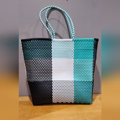 New, Never Used, Artisanal Handmade Platic Woven Tote, No Pockets, Color Teal, White And Black, Great Big Tote For The Beach And Shopping, Easy To Clean, Measurements As Shown In Pictures. Artisan Bag, Women Artisans, Womens Tote Bags, Black Blue, Blue Black, The Beach, White And Black, Women Shopping, Blue