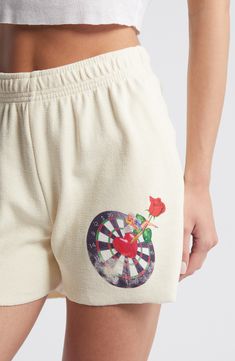 Love to lounge in these soft sweat shorts designed with a vibrant logo graphic. 4" inseam; 12 1/2" leg opening; 11 1/2" front rise, 13" back rise (size Medium) Elastic waist Side-seam pockets 100% cotton Machine wash, tumble dry Imported Graphic Print Short Bottoms For Loungewear, Graphic Print Shorts For Loungewear, Summer Wardrobe Essentials, Sneaker Slippers, Baby Boy Shoes, Sports Blazer, Made Clothing, Inspiration For Kids, Sweat Shorts