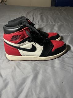 This high-top sneaker is a must-have for any Jordan fan. With a stylish gym red, summit white, and black colorway, this Air Jordan 1 Retro OG Bred Toe is sure to turn heads. The shoe features a high-quality leather upper material and a comfortable athletic style. It's perfect for men who want to add a touch of style to their wardrobe. The sneaker has a 2018 release date and a style code of 555088-610. It's available in size 12.5 and is part of the Air Jordan product line. Don't miss out on this amazing opportunity to own a piece of sneaker history. Athletic Style, Air Jordan 1 Retro, Jordan 1 Retro, Athletic Fashion, Air Jordan 1, High Quality Leather, Release Date, Jordan 1, High Top