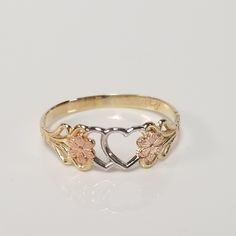 "Thanks for shopping our vintage estate store. We tend to sell well below wholesale and truly hope you enjoy all of our items. Many of the items are one of a kind, so please enjoy scrolling through the pictures and hopefully something will catch your eye. Blacks spots are from reflections or camera. Estate 10k yellow white rose gold heart flower midi or promise ring. Retails $399 on sale $129 Ring size: 7 Setting: 1/4\" 6mm by 1/2\" Band width: 2mm Weight: .92 grams Nice sweetheart ring. Marked 10k." Gold Rings Heart, Promise Rings Gold, Cute Promise Rings, Xoxo Jewelry, Flower Rings, Gold Promise Rings, Heart Flower, Jewelry Accessories Ideas, Rose Gold Heart