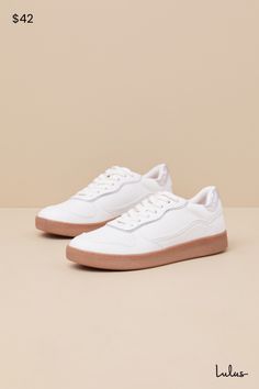 Lookin' sporty and sweet, the Lulus Callam White and Silver Color Block Lace-Up Sneakers are ready to hit the streets! Textured faux leather shapes these effortlessly cute sneakers that feature a rounded toe with perforated details and a classic lace-up vamp. Padded, low-cut collar (lined with soft terry knit) tops a textured, brown sole for a retro-inspired look. Shiny silver trim accents the vamp, instep and outstep, and heel for a color block effect! Available in whole sizes only. 1" rubber s Everyday Skate Shoes With Speckled Midsole And Round Toe, Everyday Synthetic Sneakers With Textured Sole, Skate Shoes With Speckled Midsole And Round Toe, Trendy Synthetic Everyday Sneakers, Synthetic Skate Shoes With Speckled Midsole And Round Toe, Trendy Synthetic Sneakers For Everyday, Everyday Synthetic Sneakers With Cushioned Footbed, Synthetic Sneakers With Speckled Midsole, Spring Synthetic Low-top Skate Shoes