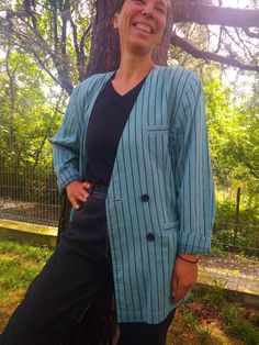 "Vintage 80s suit jacket. Double breasted striped cotton summer jacket. Magic mint black striped not lined suit jacket. Size M-L From shoulder to shoulder 17\" 43cm Bust 40\" 102cm Length 30\" 76cm Sleeve length 22\" 56cm In good vintage condition. One fabric defect between the buttons, see the last photo." Spring Pinstripe Blazer, Formal Striped Cotton Blazer, Casual Pinstripe Long Sleeve Blazer, Striped Cotton Blazer For Formal Occasions, Pinstripe Cotton Blazer For Workwear, Vintage Striped Outerwear For Spring, Pinstripe Cotton Blazer For Work, Vintage Striped Spring Outerwear, Spring Cotton Pinstripe Blazer