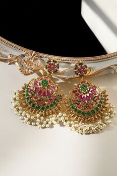 Elevate your style with the "Inaya - Statement Earrings & Maang Tikka Set." This exquisite set is a testament to timeless beauty and elegance, inspired by the classic Navratan style. Crafted with meticulous attention to detail, it offers a grandeur to leave a lasting impression.The oversized chandbali earrings and tikka are adorned with an array of stunning gems, representing the Navratnas. They are a brilliant fusion of tradition and luxury, perfect for special occasions and celebrations. Make Traditional Blue Kundan Bridal Earrings, Traditional Blue Kundan Earrings, Luxury Bollywood Blue Earrings, Festive Blue Kundan Chandelier Earrings, Elegant Blue Meenakari Chandelier Earrings, Maang Tikka Set, Ear Chain, Chandbali Earrings, Accessories Ear