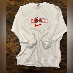 Candy Cane Crew Neck! Casual White Sweatshirt For Game Day, Casual White Tops For Game Day, White Casual Sweatshirt For Game Day, White Casual Game Day Top, Red Crew Neck Sweatshirt Sporty Style, Candy Cane Nike Sweatshirt, Sporty University Red Crew Neck Sweatshirt, Classic Red Crew Neck Sweatshirt, Red Crew Neck Sporty Sweatshirt