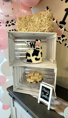 Decorations for a cow themed birthday party. Cow Themed Birthday Party Decoration, Moo Moo I’m Two Birthday Party, Ranch Birthday Party Ideas, Moo Moo I'm Two Birthday Food, Moo Moo I’m Two Food Ideas, Moo Moo Im Two, Cow Party Food Ideas, Cow Birthday Party Food, First Birthday Cow Theme