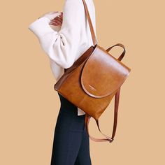 Top Grain Leather Backpack Women City Backpack Natural Cowhide Leather Travel Backpack Stylish Shoulder Bag Christmas Gift SX2612-1 Model Number: SX2612-1 Dimensions: 9.8"L x 3.9"W x 11.4"H / 25 cm(L) x 10 cm(W) x 29 cm(H) Weight: 1.98 lb / 0.9 kg Hardware: Silver Hardware Shoulder Strap: Adjustable Color: Brown / Coffee / Black / Green Features: • Genuine Natural Leather• Inside 1 Cell Pocket, 1 Wallet Pocket, 2 Zipper Pockets.• YKK Zipper• Adjustable Shoulder Strap• Can fit an iPad, iPhone, Bo Leather Backpack Women, Leather School Bag, Leather Travel Backpack, Tandy Leather, Leather Suspenders, City Backpack, Animal Bag, Women Leather Backpack, Backpack Women