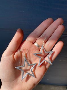 These cute silver star earrings are made with 3D printed plastic materials, and are accompanied by silver plated earring hooks and loops with rubber earring stoppers. Star Drop Earrings, Silver Star Earrings, Dark Star, Earring Hooks, San Antonio Tx, Silver Stars, Star Earrings, 3d Printed, San Antonio