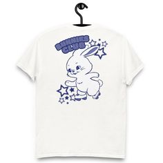 New Jeans Bunnies Tokki T-Shirt Great gift for BUNNIES or a concert shirt! 🐰  * 100% cotton  * Taped neck and shoulders  * Double seam at sleeves and bottom hem * Unisex sizing Cute Graphic Design T-shirt For Streetwear, Kpop Style Cotton Shirt With Short Sleeves, Cute Shirt With Funny Print For Streetwear, Cotton Kpop T-shirt With Short Sleeves, Kpop Short Sleeve Shirt With Graphic Print, Kpop Style Cotton T-shirt For Streetwear, White Kpop T-shirt For Streetwear, Cute Graphic T-shirt For Streetwear, Kpop Style Shirt For Streetwear With Short Sleeves