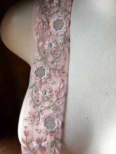 Great design and colors in this fantastic trim, Gorgeous PINK and GOLD embroidery on a net backing. SHIPS FROM THE USA. Our newest addition to our ever-growing offerings of fine trims and fabrics.  * Measures 2" in width. * Listing is for ONE YARD -  MAY BE LIMITED AS OUR SUPPLIER CHANGES DESIGNS FREQUENTLY AND WON'T REPEAT DESIGNS WITHOUT A HUGE ORDER.  These rolls are rather short, only about 8 or 9 yards each. We've only ordered in a small quantity to see how well they are loved, but I feel q Pink Machine-embroidered Fabric For Weddings, Pink Machine Embroidered Fabric For Wedding, Pink Embroidered Fabric For Wedding With Machine Embroidery, Bollywood Style Embellished Pink Embroidered Fabric, Pink Embellished Embroidered Fabric For Festive Occasions, Festive Pink Embellished Embroidered Fabric, Pink Floral Embroidered Fabric For Celebration, Pink Bollywood Embroidered Fabric For Celebration, Pink Bollywood Style Embroidered Fabric For Celebration