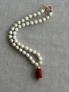 White Hand Knotted Jewelry With Round Beads, Hand Knotted White Round Bead Jewelry, White Hand Knotted Spiritual Jewelry, White Hand Knotted Necklace Gift, Colored Necklace, Coral Beads Necklace, Beaded Jewelry Necklaces, Jewelry Design Inspiration, Coral Pendant