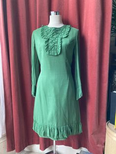 Green Lined Vintage Dress, Vintage Green Midi Length Dress, Green Vintage Dress For Evening, Elegant Green Midi Vintage Dress, Green Vintage Formal Dress, Green Vintage Dress For Fall, Vintage Green Formal Dress, Green Long Sleeve Vintage Dress For Party, Green Lined Dresses For Work