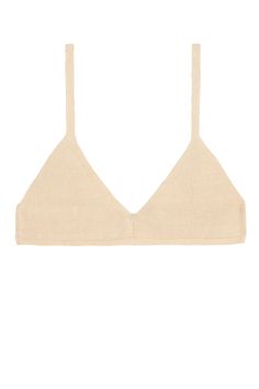 Cozy summer knit bra top with large hook closure. Cream fabric is 100% linen. Ella is 6' tall, 35" bust, 26" waist, 36" hip, and is wearing a size S. Fitted Cropped Bra For Loungewear, Cropped Fitted Bra For Loungewear, Cropped Summer Loungewear Bra, Summer Loungewear Crop Top With Removable Bra Pads, Fitted Triangle Beige Crop Top, Fitted Beige Triangle Crop Top, Summer Triangle Crop Top With Removable Bra Pads, Summer Triangle Top With Seamless Construction, Casual Triangle Top For Loungewear