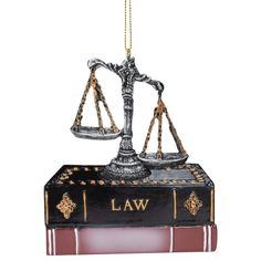 PRICES MAY VARY. Charming decorative ornament depicts the law of justice; Accents with scholarly books Ornament is made of a durable resin material and hangs from a gold cord Decorative hanging ornament measures approximately 4 inches tall; A perfect giftable for the lawyer in your life Perfect for hanging display on a Christmas tree or ornament stand for the holidays Packed within protective packaging . Made of resin. Item Size: 4-inches tall Lady Justice Statue, Justice Statue, Libra Jewelry, Ornament Stand, Scales Of Justice, Hanging Display, Candy Cane Ornament, Law Books, Holiday Packing