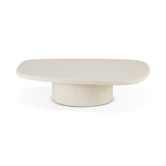 a white table with a circular base on the top and one round surface on the bottom