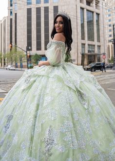 Light up the room in this beaded applique long off shoulder puff sleeve dress with A-line skirt by Rachel Allan RQ3128. Discover elegance and grace in this tulle ballgown. This romantic ballgown radiates with sophistication and is sure to leave a lasting impression. The off-the-shoulder neckline is hand beaded with applique and fringed detailing, adding a regal look to the entire silhouette. Detachable tulle sleeves provide a subtle vintage touch and a lace-up back offers the ultimate fit. As yo Off Shoulder Puff Sleeve Dress, Off Shoulder Puff Sleeve, Tulle Ballgown, Mary's Bridal, Shoulder Puff Sleeve, Cinderella Divine, Tulle Sleeves, Dresses Quinceanera, Rachel Allan