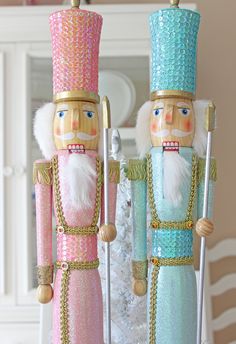 two nutcrackers are standing next to each other