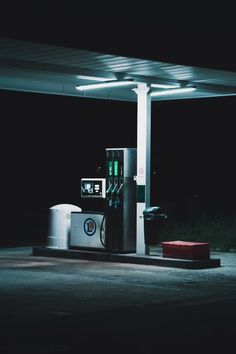 an empty gas station at night time