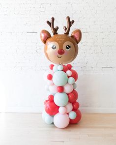 reindeer-balloon-column-christmas Reindeer Birthday Party, Reindeer Christmas Party, Reindeer Party Decorations, Reindeer Party, Reindeer Themed Christmas Party, Christmas Balloon Columns, Nutcracker Christmas Balloons, Gingerbread Theme Balloon Garland, Reindeer Balloon