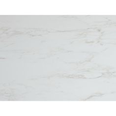 a white marble counter top that looks like it has been polished