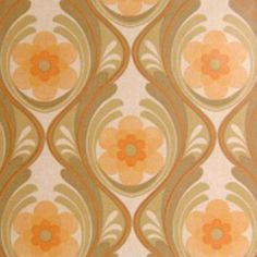 an orange and green wallpaper with flower designs on it's side, in the middle