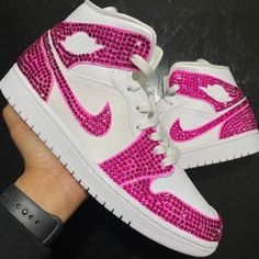 Take a risk and make a statement with these custom Pink Rhinestone Air Jordan 1s. Perfect for your special day, stand out from the crowd and add a touch of sparkle to your wedding sneaker collection. Get ready to wow! 🔥 100% genuine, Brand New.👟 Custom sneakers.💫 Every pair is hand-made to order.✨ Best quality waterproof and scratch-proof paints used.✨ 1000+ satisfied customers across various platforms. 🌎Free worldwide shipping,shipping within 5-12 working days🎁 Treat the shoes as art as th Custom Air Jordan 1, Bedazzled Shoes, Nike Shoes Women Fashion, Pink Nike Shoes, Custom Jordans, Take A Risk, Air Jordan 1s, Nike Fashion Shoes, Preppy Shoes