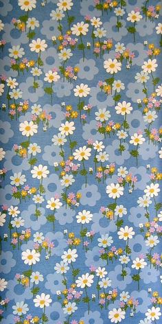 a blue background with white and yellow flowers