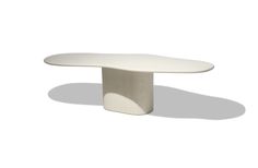 a white table with an oval shape on the top and one leg in the middle