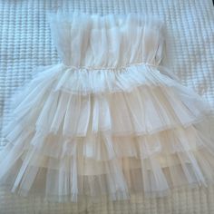 New With Tags! Absolutely Adorable Strapless Tutu Tulle Mini Dress! Spring Fitted Tiered Tutu Dress, White Tiered Tutu Dress For Spring, White Tiered Dress For Dress-up, Chic White Dress For Dress-up, White Tiered Tutu Dress With Ruffles, White Chic Dress For Formal Occasions, Cream Ruffled Tutu Dress For Summer, White Tiered Mini Dress For Party, White Tiered Party Mini Dress